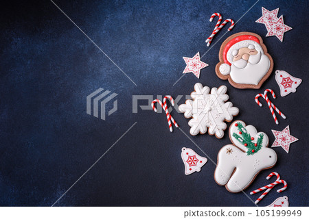 Beautiful festive Christmas gingerbread made by hand with decoration elements 105199949