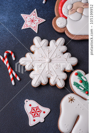Beautiful festive Christmas gingerbread made by hand with decoration elements 105199952