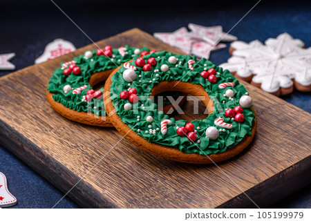 Beautiful festive Christmas gingerbread made by hand with decoration elements 105199979