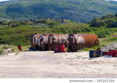 gas station in mountains i Arctic with barrels gas station in mountains i Arctic with barrels 105201589