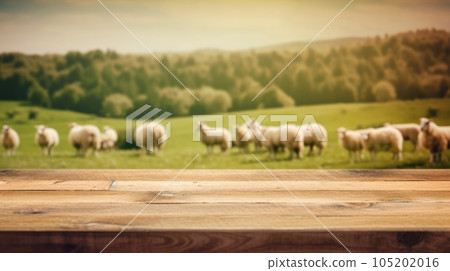 The empty wooden brown table top with blur background of sheep pasture. Exuberant. The empty wooden brown table top with blur background of sheep pasture. Exuberant. 105202016
