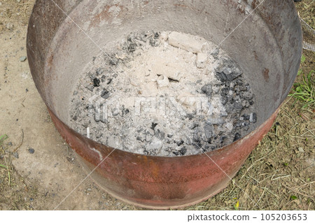 [Auto campsite, drum can charcoal disposal site] 105203653