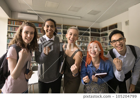 Cheerful excited high school mates celebrating educational achievement Cheerful excited high school mates celebrating educational achievement 105204799