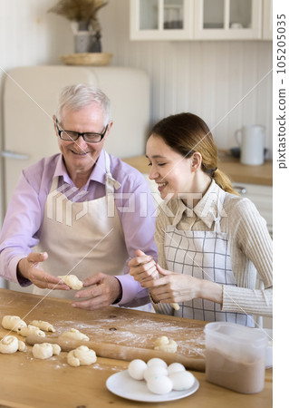 Happy granddad enjoying retirement, family meeting, domestic activities Happy granddad enjoying retirement, family meeting, domestic activities 105205035