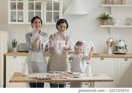 Excited girls and women of three family generations having fun 105205054