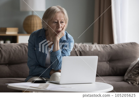Old stressed woman manage family finances feels desperate due debts 105205625