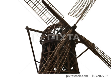Old wooden mechanical windmill model isolated on white with clipping path. High quality photo Old wooden mechanical windmill model isolated on white with clipping path. High quality photo 105207796
