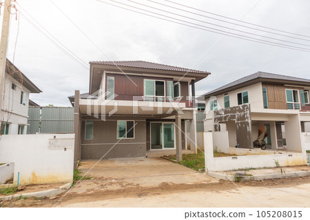 construction residential new house in progress at building site 105208015