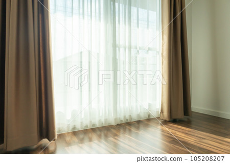 Curtain window interior decoration in living room on sunny day with sunlight Curtain window interior decoration in living room on sunny day with sunlight 105208207