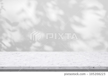 Marble table with tree shadow drop on white wall background for mockup product display Marble table with tree shadow drop on white wall background for mockup product display 105208223