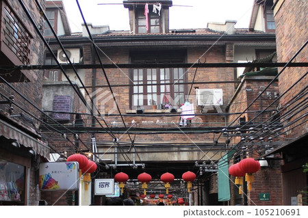 A shopping street in the back alley of Tianzifang, Shanghai A shopping street in the back alley of Tianzifang, Shanghai 105210691