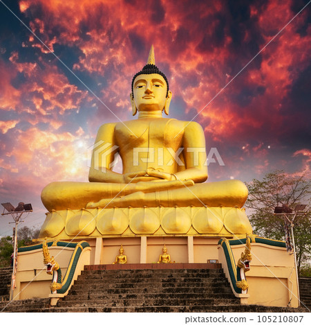 Golden Buddha overlooking Pakse at Wat Phousalao. Laos 105210807