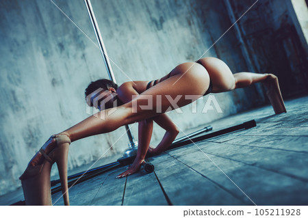 Woman pole dancing 105211928