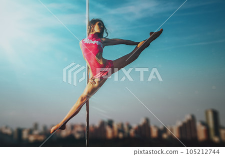 Young pole dance woman 105212744