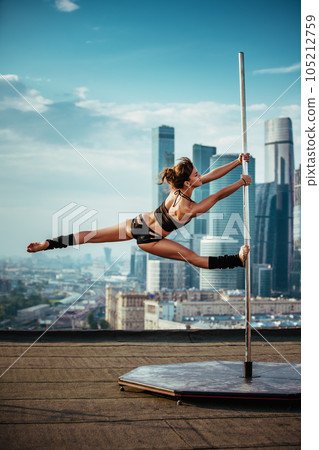 Young pole dancing woman Young pole dancing woman 105212759