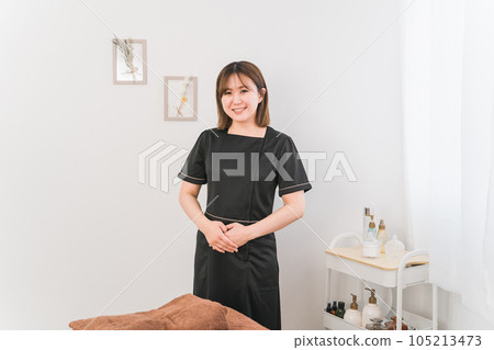 Esthetician woman working in salon Esthetician woman working in salon 105213473