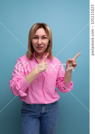 young smart blond european office worker lady with flowing hair in pink blouse reports idea on young smart blond european office worker lady with flowing hair in pink blouse reports idea on 105215823
