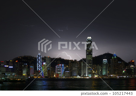 Hong Kong Island by night with thunder striking 105217443