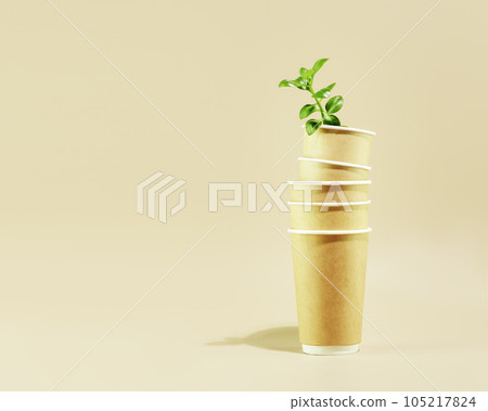 Concept of ecology, conservation, plastic free and recycling. Sustainable minimalistic still life with green shoot in disposable eco friendly cardboard cups on beige background with copy space 105217824