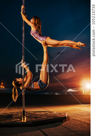 Young pole dancing women 105218738