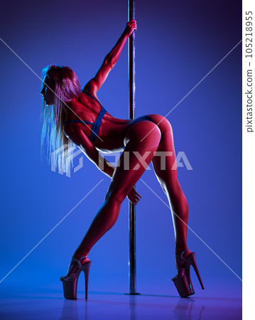 Woman poledancing Woman poledancing 105218955