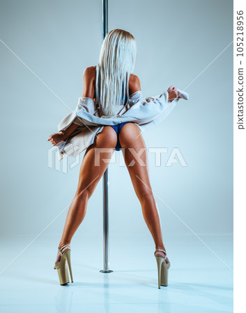 Woman poledancing Woman poledancing 105218956