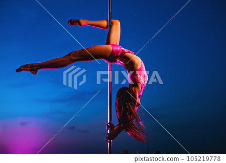 Young pole dancing woman 105219778