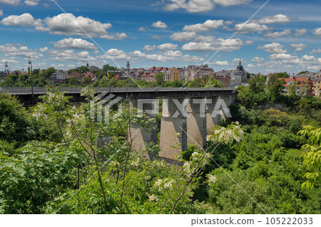 Kamianets-Podilskyi cityscape with Novoplanovsky bridge over the Smotrytsky canyon, Ukraine. 105222033