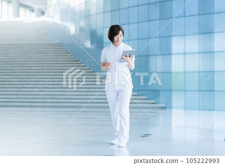 Young nurse working in a hospital Young nurse working in a hospital 105222993