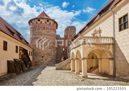 Latvian tourist landmark attraction. Medieval Bauska Castle courtyard. Ruins of medieval castle and the remains of a later palace. Bauska, Latvia. Latvian tourist landmark attraction. Medieval Bauska Castle courtyard. Ruins of medieval castle and the remains of a later palace. Bauska, Latvia. 105223503