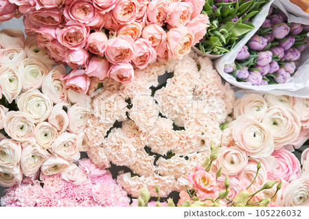 Many different colors. Showcase. Background of mix of flowers. Beautiful flowers for catalog or online store. Floral shop and delivery concept. Top view 105226032