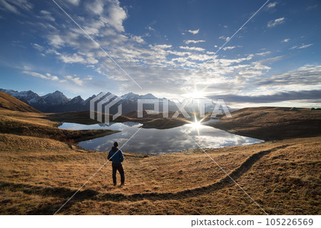 Landscape with a mountain lake and a beautiful sunrise Landscape with a mountain lake and a beautiful sunrise 105226569