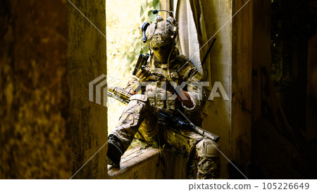 Smart teamwork of soldiers running forward and attacking enemy during military operation, Army soldiers in protective combat uniform, Soldiers with rifle, Soldiers with rifle on world war field 105226649