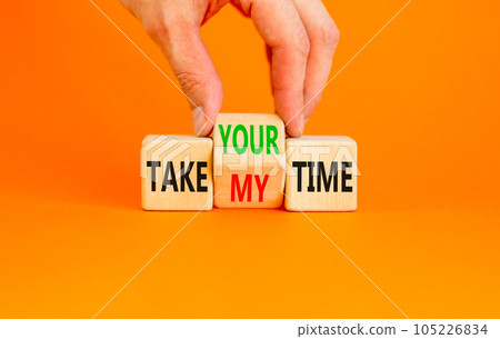 Take your or my time symbol. Concept words Take your or my time on wooden cubes. Businessman hand. Beautiful orange table orange background. Business and Take your or my time concept. Copy space. 105226834