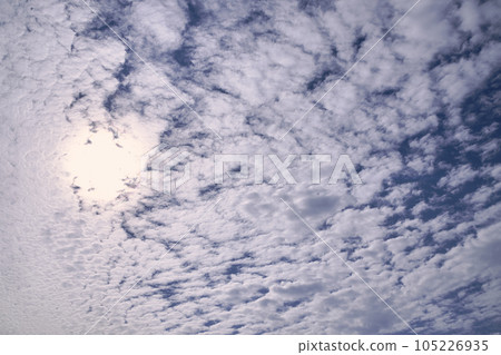 Blue sky full of white clouds, sunny day 105226935