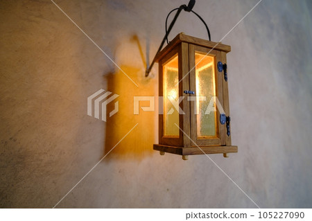 Medieval castle candle lantern. A source of light in ancient times. The only lighting in the Middle Ages. Latvia Bauska Castle Medieval castle candle lantern. A source of light in ancient times. The only lighting in the Middle Ages. Latvia Bauska Castle 105227090