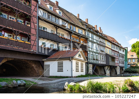 Merchants Bridge, Kraemerbruecke in Erfurt, Germany. It is built over entirely with houses Merchants Bridge, Kraemerbruecke in Erfurt, Germany. It is built over entirely with houses 105227247