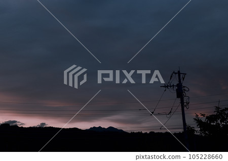Hakushu-cho, Hokuto City, sunset clouds over utility poles, darkening northern sky Hakushu-cho, Hokuto City, sunset clouds over utility poles, darkening northern sky 105228660