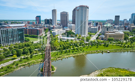 Train bridge leading into downtown of Columbus Ohio past American Electric Power skyscraper aerial Train bridge leading into downtown of Columbus Ohio past American Electric Power skyscraper aerial 105229178