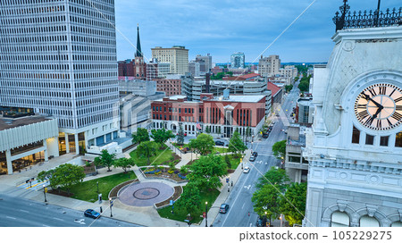 Clocktower sunset sunrise aerial with green courtyard downtown skyscrapers Louisville KY 105229275