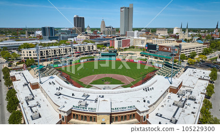 Skyscraper and church steeple skyline downtown Fort Wayne with Parkview Field baseball Skyscraper and church steeple skyline downtown Fort Wayne with Parkview Field baseball 105229300