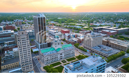 Soft orange sunrise over downtown Fort Wayne with courthouse and PNC and Lincoln Bank Tower Soft orange sunrise over downtown Fort Wayne with courthouse and PNC and Lincoln Bank Tower 105229302