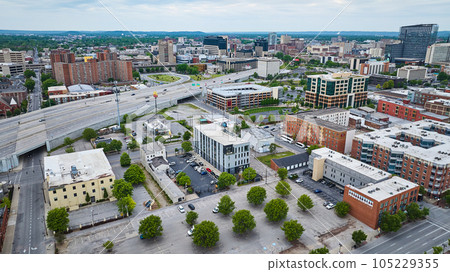 Louisville Kentucky aerial downtown office buildings, parking lot, and highway system 105229355