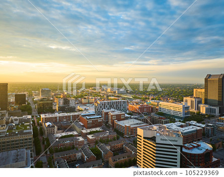 Columbus Ohio aerial with sunrise over city apartment buildings Columbus Ohio aerial with sunrise over city apartment buildings 105229369