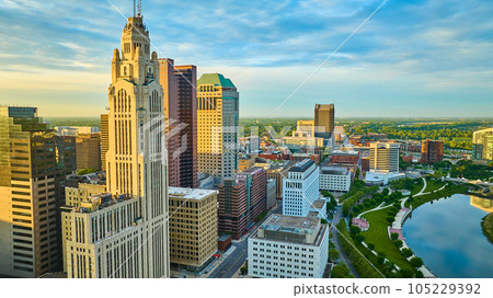 Columbus Ohio heart of downtown aerial at sunrise with iconic buildings and Scioto River Columbus Ohio heart of downtown aerial at sunrise with iconic buildings and Scioto River 105229392