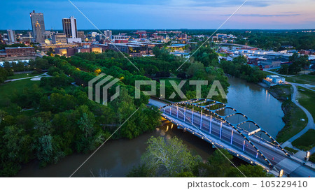 Dusk lighting and city lights around Martin Luther King Bridge aerial near Headwaters Park Dusk lighting and city lights around Martin Luther King Bridge aerial near Headwaters Park 105229410