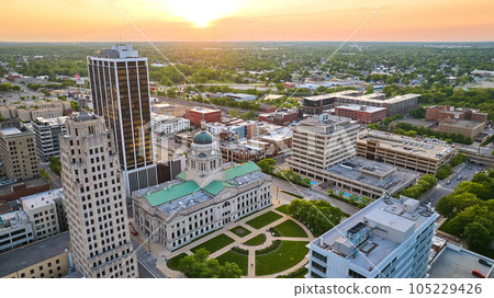 Sunset over downtown Fort Wayne courthouse with PNC Center and Lincoln Bank Tower buildings 105229426