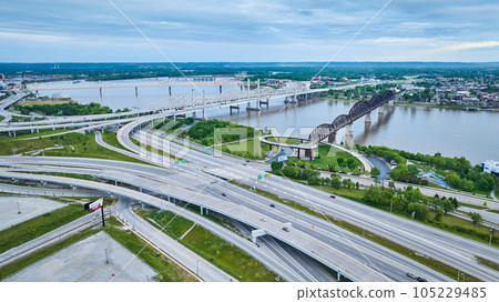 Four bridges over Ohio River Aerial view white gold, concrete, and iron arch truss with highways 105229485