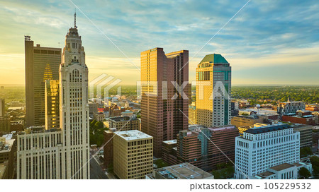 Four main downtown Columbus Ohio skyscrapers aerial at sunrise with golden lighting 105229532