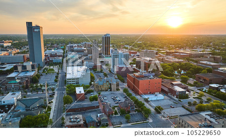 Sunrise over downtown Fort Wayne industrial buildings aerial 105229650